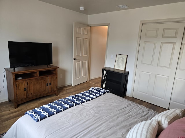 1285 Peppertree Dr, Montrose, CO 81401 - bedroom featuring wood finished floors and baseboards