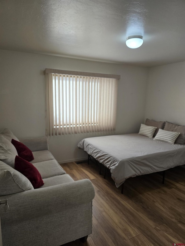 1285 Peppertree Dr, Montrose, CO 81401 - bedroom featuring wood finished floors