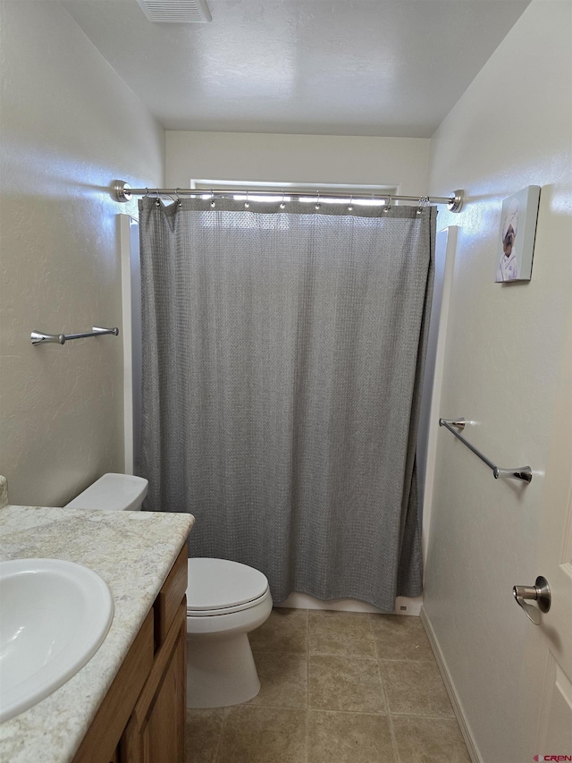 1285 Peppertree Dr, Montrose, CO 81401 - bathroom featuring vanity, a shower with shower curtain, and tile patterned floors