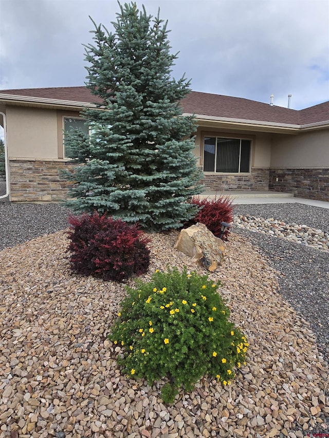 1285 Peppertree Dr, Montrose, CO 81401 - view of front of property featuring stone siding and stucco siding