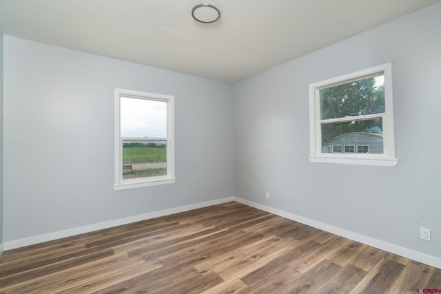 6038 Townsend Rd, Delta, CO 81416 - unfurnished room featuring wood finished floors and baseboards