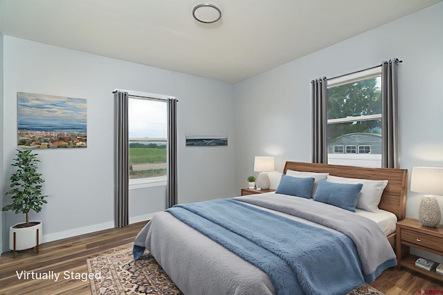 6038 Townsend Rd, Delta, CO 81416 - bedroom featuring wood finished floors and baseboards