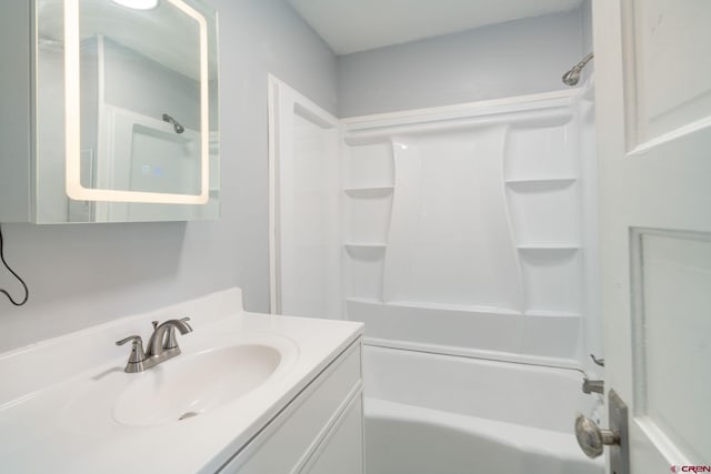 6038 Townsend Rd, Delta, CO 81416 - full bath featuring vanity and shower / tub combination