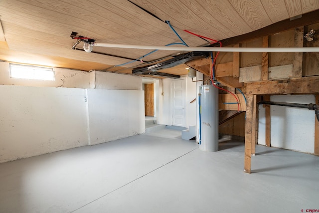 6038 Townsend Rd, Delta, CO 81416 - below grade area with gas water heater and stairs