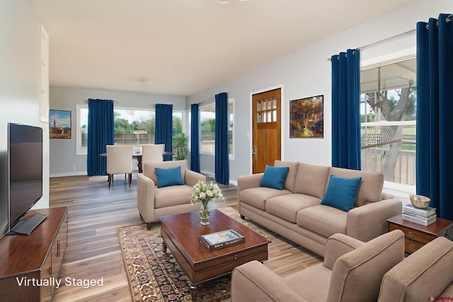 6038 Townsend Rd, Delta, CO 81416 - living room featuring healthy amount of natural light and wood finished floors