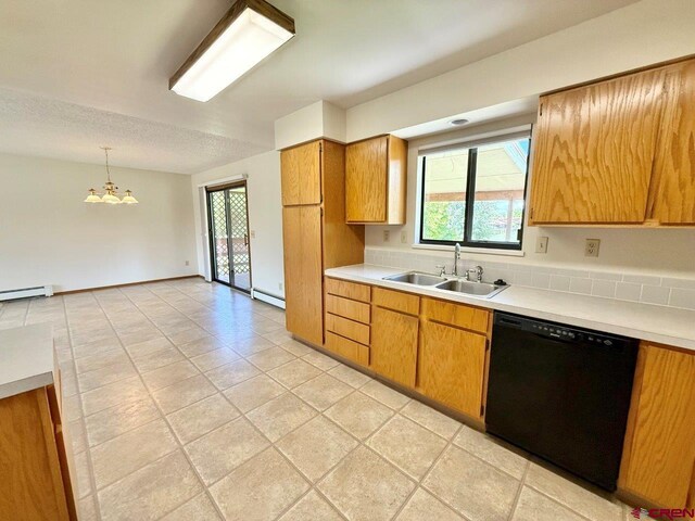 2343 Oldham Way, Montrose, CO 81401 - kitchen with black dishwasher, a baseboard radiator, light countertops, and a chandelier