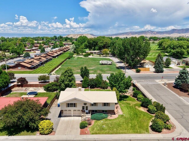 2343 Oldham Way, Montrose, CO 81401 - aerial view of property and surrounding area with a mountainous background