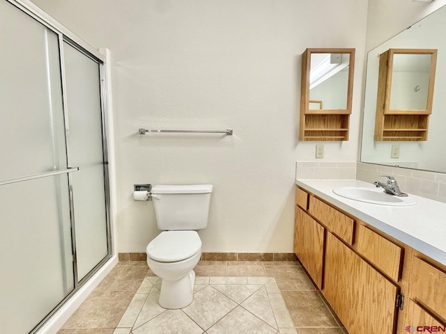 2343 Oldham Way, Montrose, CO 81401 - full bath with vanity, a shower stall, and tile patterned floors