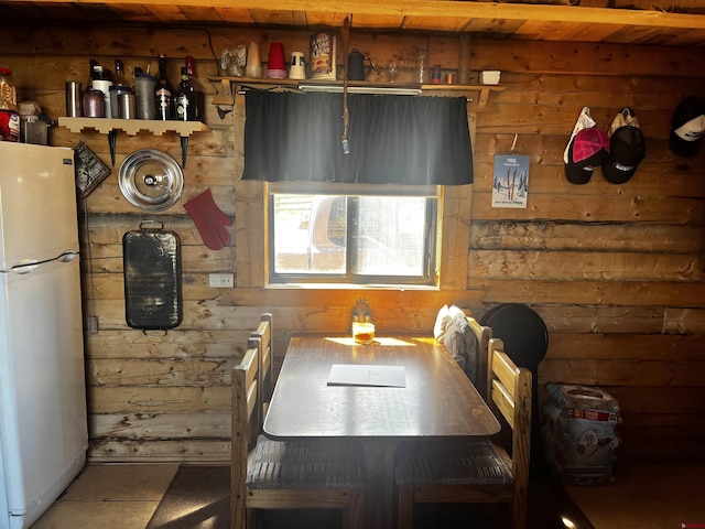 1165 Timber Ridge Rd, Montrose, CO 81401 - dining room featuring wood walls