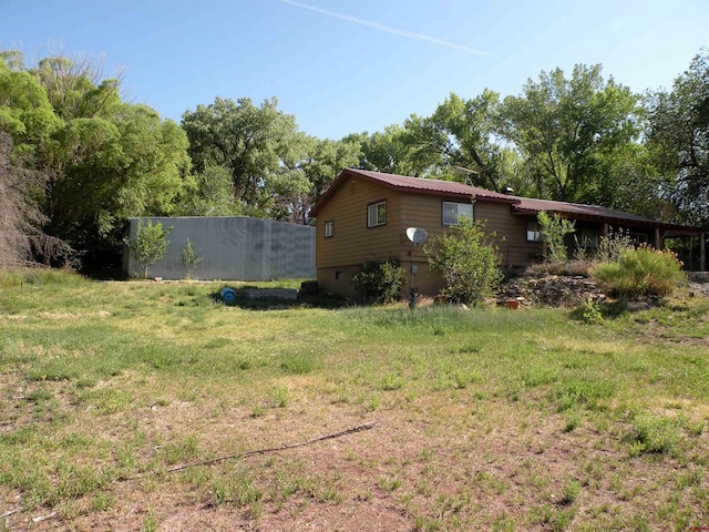 27793 Bb Rd, Nucla, CO 81424 - view of property exterior featuring a yard and a metal roof