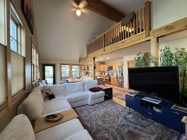 607 Second St Unit B, Crested Butte, CO 81224 - living area featuring high vaulted ceiling and beam ceiling