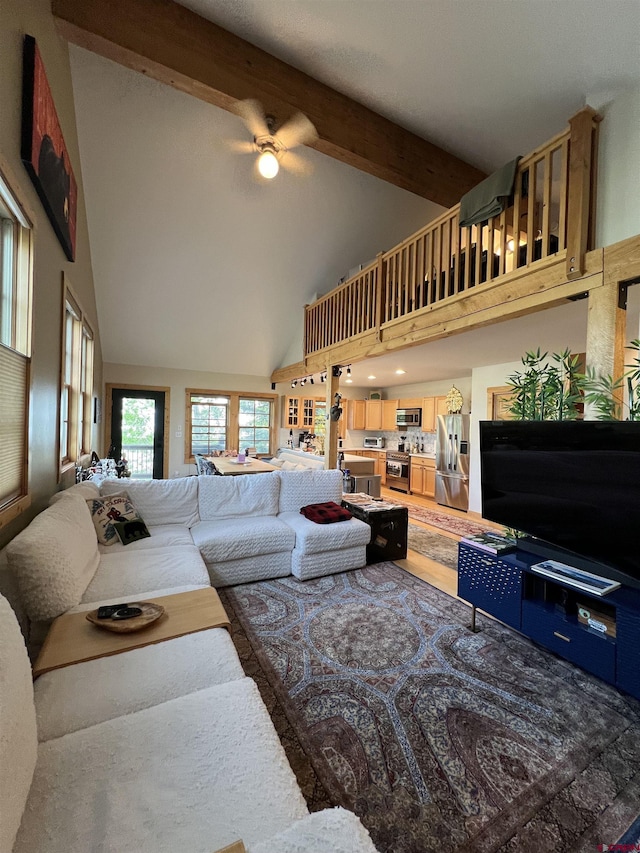 607 Second St Unit B, Crested Butte, CO 81224 - living area with a ceiling fan, high vaulted ceiling, and beamed ceiling