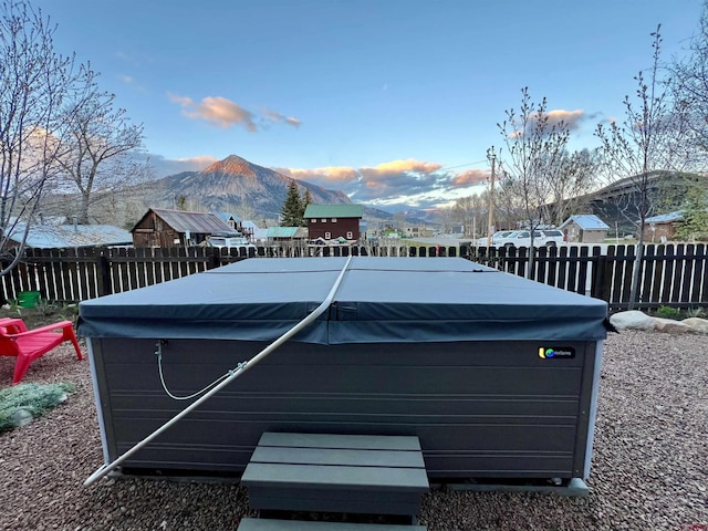607 Second St Unit B, Crested Butte, CO 81224 - exterior space featuring a hot tub and a mountain view
