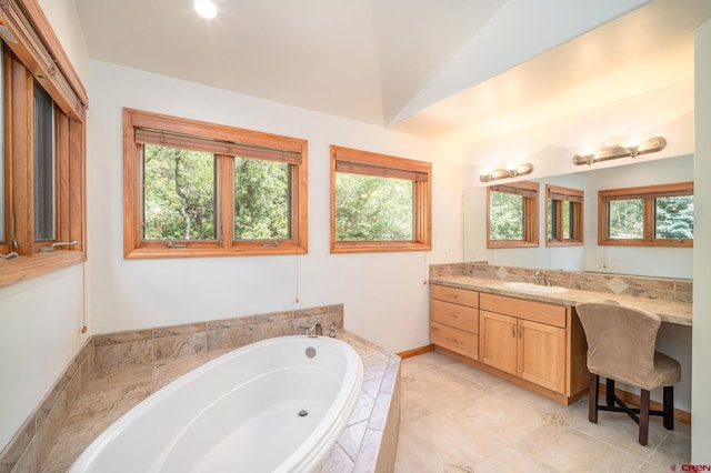 95 Ute Pass W, Durango, CO 81301 - bathroom with a garden tub, vanity, healthy amount of natural light, and lofted ceiling