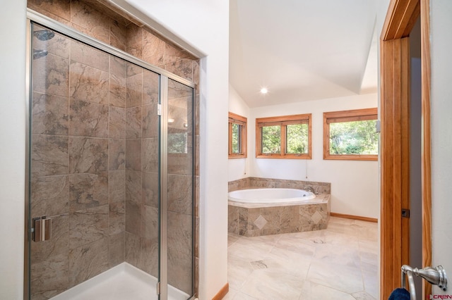 95 Ute Pass W, Durango, CO 81301 - bathroom featuring a garden tub, vaulted ceiling, and a shower stall