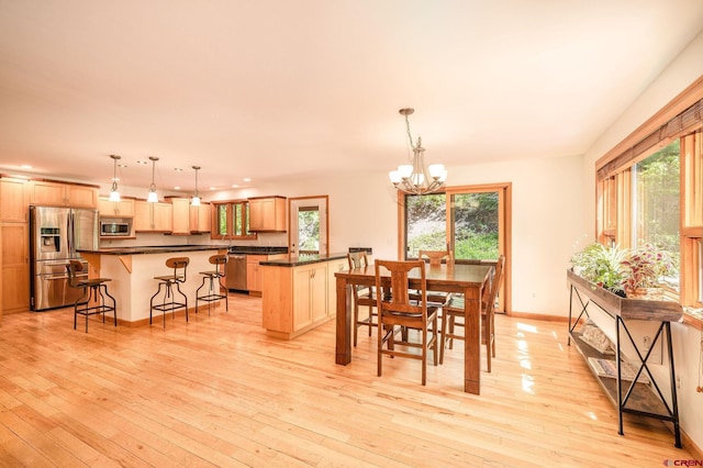 95 Ute Pass W, Durango, CO 81301 - dining space with a chandelier, light wood finished floors, and recessed lighting