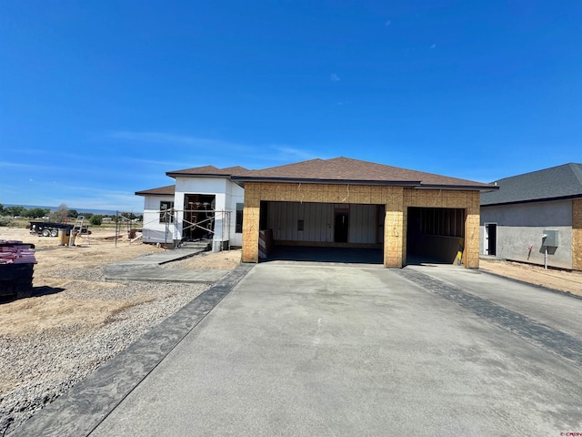 1526 Criterion St, Delta, CO 81416 - property in mid-construction featuring driveway and a garage