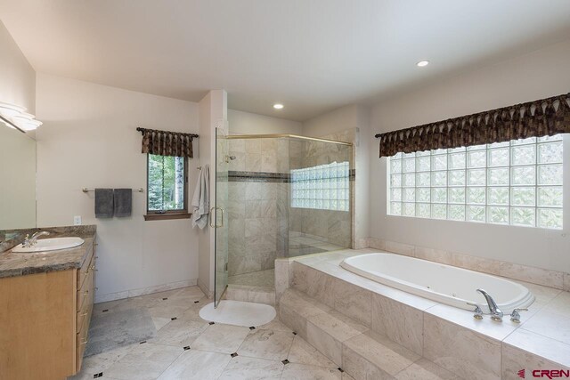 435 Red Rock Rd, Durango, CO 81301 - bathroom with a garden tub, vanity, a shower stall, and recessed lighting