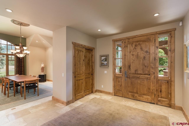 435 Red Rock Rd, Durango, CO 81301 - foyer entrance with a chandelier, recessed lighting, and healthy amount of natural light