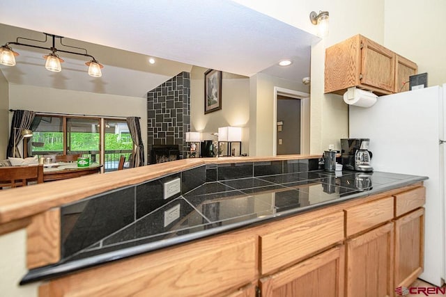 166 Yankee Girl Ct Unit 313, Durango, CO 81301 - kitchen featuring freestanding refrigerator, dark countertops, light brown cabinets, and recessed lighting