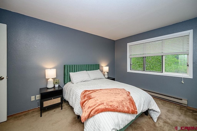166 Yankee Girl Ct Unit 313, Durango, CO 81301 - bedroom featuring baseboard heating and carpet floors