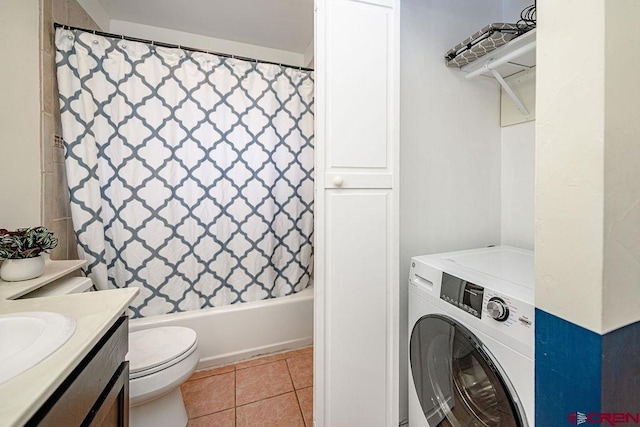 166 Yankee Girl Ct Unit 313, Durango, CO 81301 - laundry area with washer / dryer and light tile patterned flooring