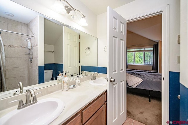 166 Yankee Girl Ct Unit 313, Durango, CO 81301 - full bathroom featuring double vanity, ensuite bath, and tiled shower