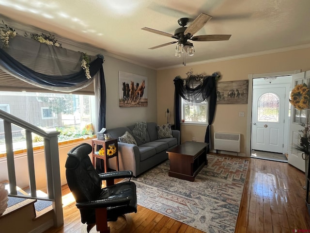 1250 Snowden St, Silverton, CO 81433 - living area with wood-type flooring, a ceiling fan, and crown molding