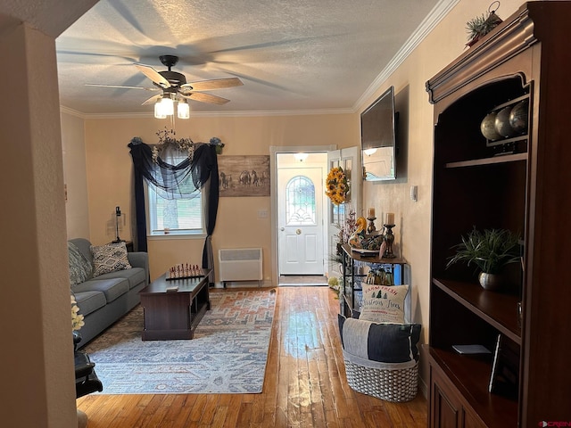 1250 Snowden St, Silverton, CO 81433 - foyer with a ceiling fan, hardwood / wood-style floors, a textured ceiling, and crown molding