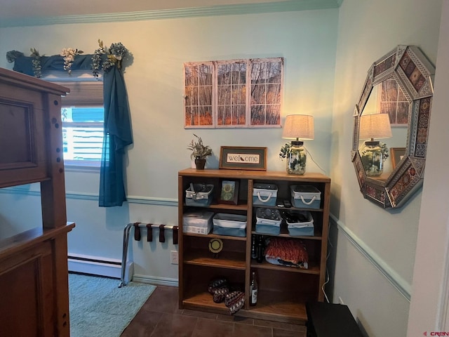 1250 Snowden St, Silverton, CO 81433 - hall featuring a baseboard heating unit, dark tile patterned flooring, and crown molding