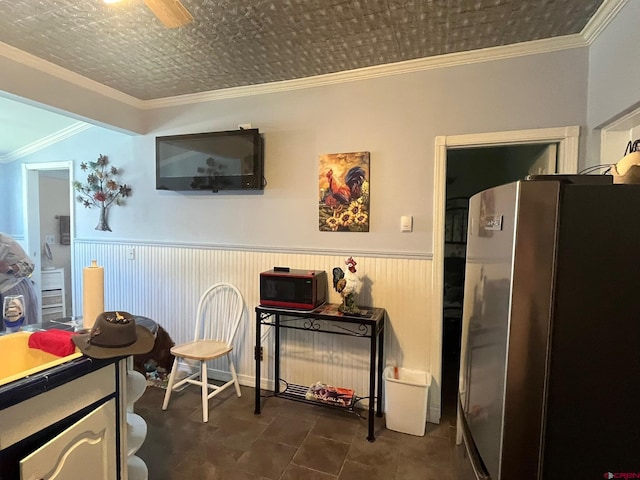 1250 Snowden St, Silverton, CO 81433 - living area featuring a wainscoted wall, ornamental molding, and an ornate ceiling