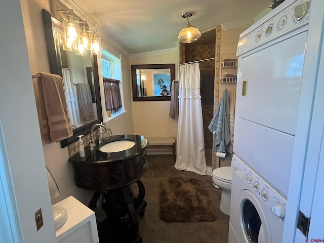 1250 Snowden St, Silverton, CO 81433 - full bath with stacked washer / dryer, ornamental molding, and a shower with shower curtain