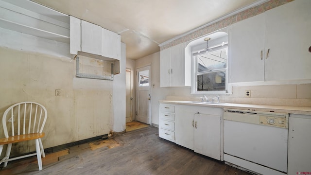 735 Teller Ave, Grand Junction, CO 81501 - kitchen with white dishwasher, dark wood-style floors, light countertops, and white cabinets