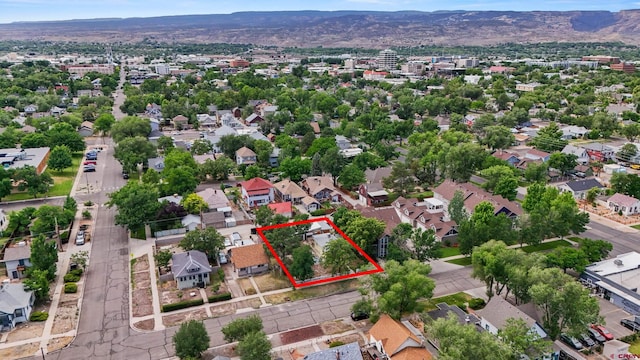 735 Teller Ave, Grand Junction, CO 81501 - aerial view of residential area featuring property boundaries highlighted and mountains
