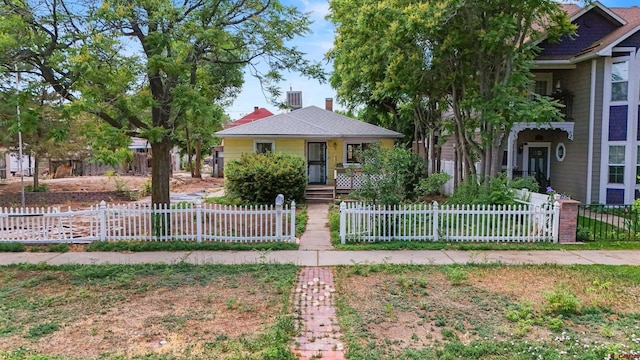 735 Teller Ave, Grand Junction, CO 81501 - view of front of property with a fenced front yard and covered porch