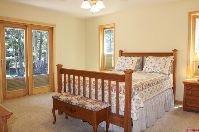 67 Gleneagles Dr, Durango, CO 81301 - bedroom featuring carpet flooring, ceiling fan, and access to exterior