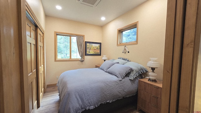 67 Gleneagles Dr, Durango, CO 81301 - bedroom featuring wood finished floors, recessed lighting, and a closet