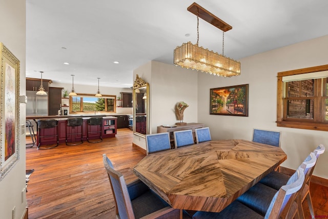 322 Wapiti Ln, Crested Butte, CO 81224 - dining area with light wood-style floors and recessed lighting