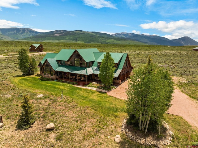 322 Wapiti Ln, Crested Butte, CO 81224 - aerial view of property and surrounding area with a mountainous background
