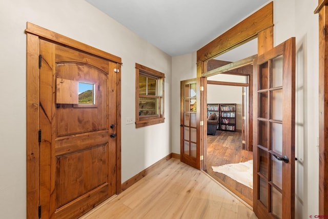 322 Wapiti Ln, Crested Butte, CO 81224 - entryway featuring french doors and light wood-style floors