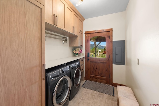 322 Wapiti Ln, Crested Butte, CO 81224 - laundry room featuring electric panel, cabinet space, and washer and dryer