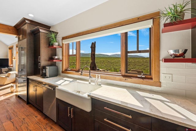 322 Wapiti Ln, Crested Butte, CO 81224 - kitchen with open shelves, stainless steel dishwasher, dark wood-style floors, recessed lighting, and decorative backsplash