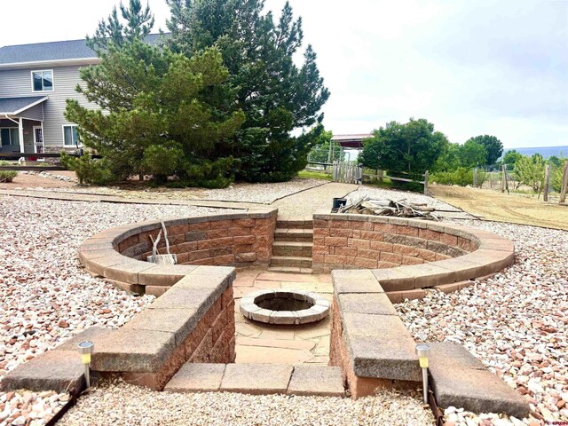 12689 6100th Rd, Montrose, CO 81401 - view of patio with an outdoor fire pit