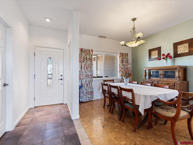 12689 6100th Rd, Montrose, CO 81401 - dining area with a chandelier and baseboards