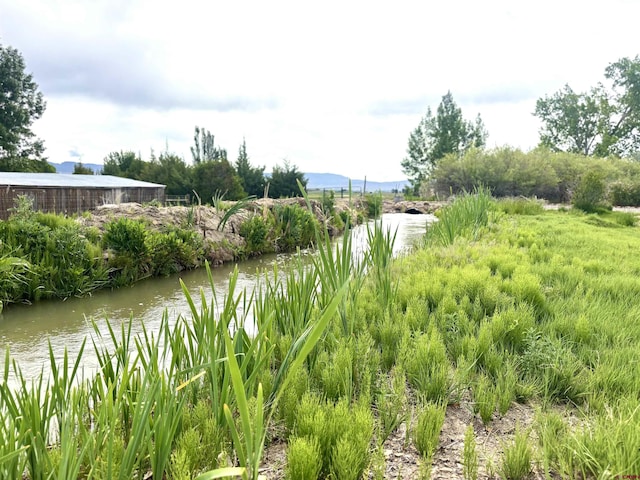 12689 6100th Rd, Montrose, CO 81401 - water view with a mountainous background