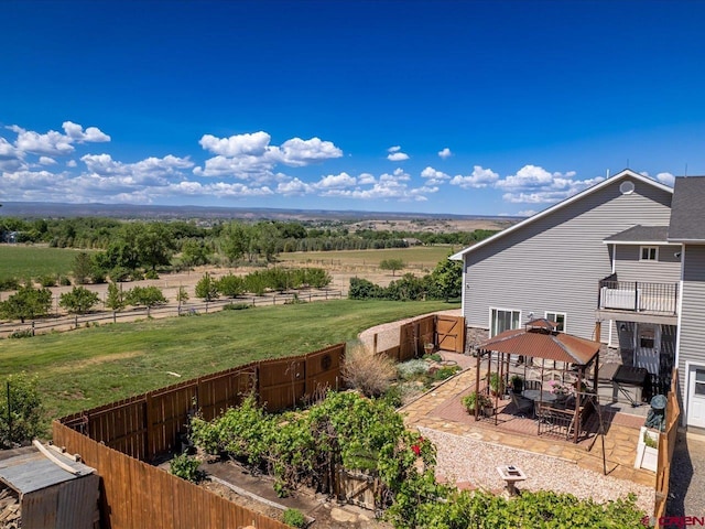 12689 6100th Rd, Montrose, CO 81401 - fenced backyard with a gazebo, a view of rural / pastoral area, and a patio