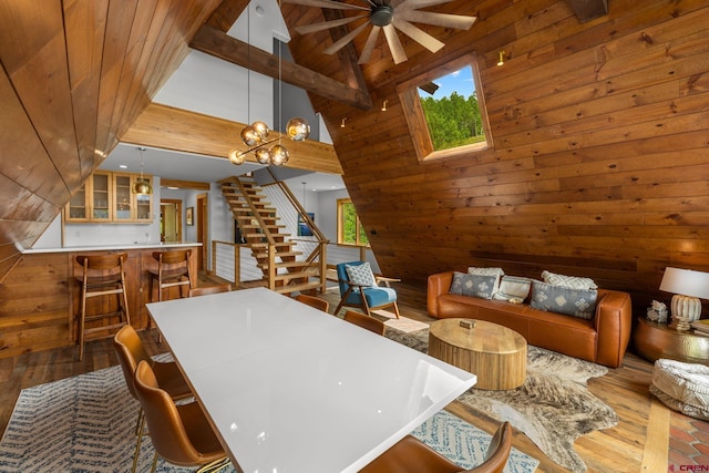 41 Cinnamon Mountain Rd, Mount Crested Butte, CO 81225 - living area with stairway, high vaulted ceiling, ceiling fan, wood finished floors, and wooden walls