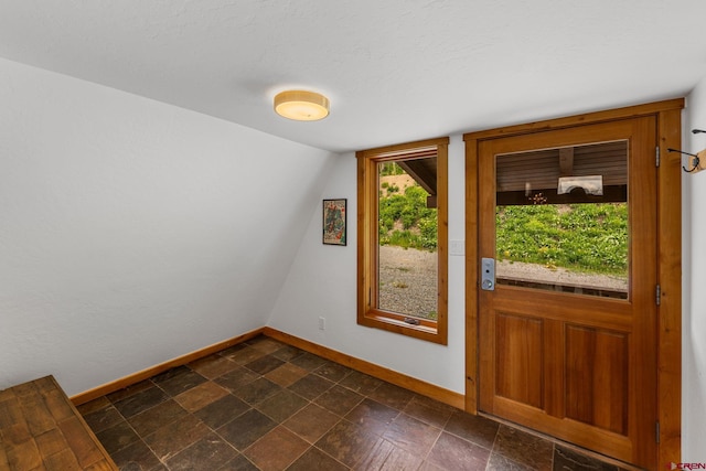 41 Cinnamon Mountain Rd, Mount Crested Butte, CO 81225 - entryway featuring baseboards and lofted ceiling