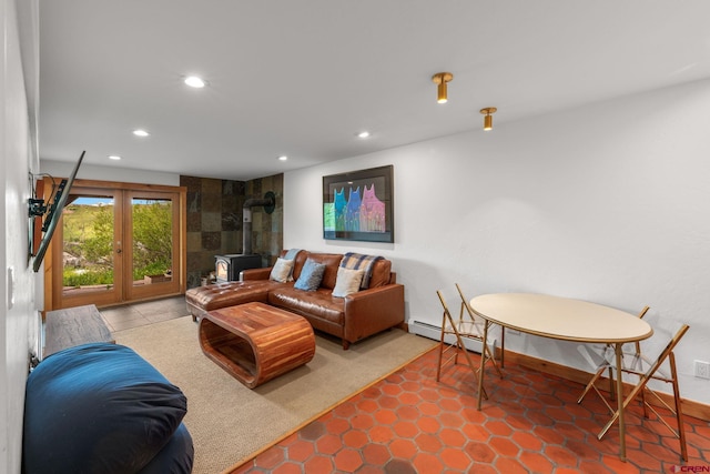 41 Cinnamon Mountain Rd, Mount Crested Butte, CO 81225 - living room featuring a wood stove, recessed lighting, and a baseboard radiator