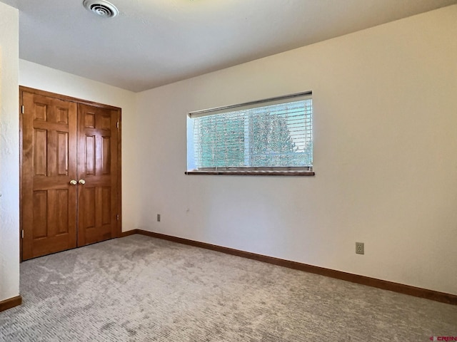 404 SE Birdie Cir, Cedaredge, CO 81413 - unfurnished bedroom with carpet floors and baseboards